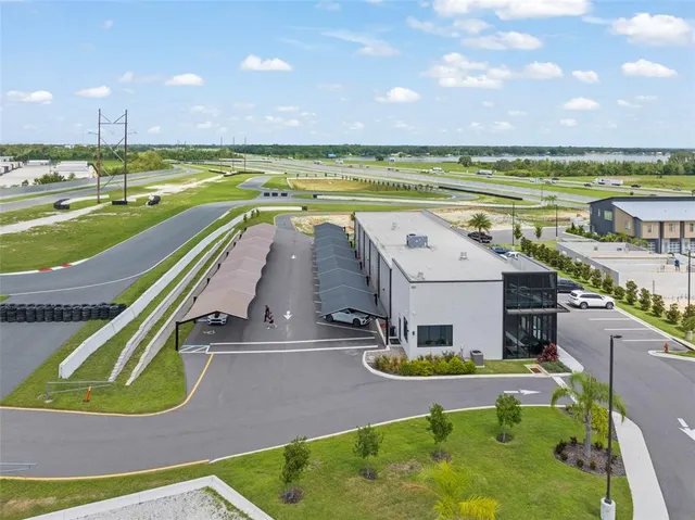 a large kitchen with a table and chairs