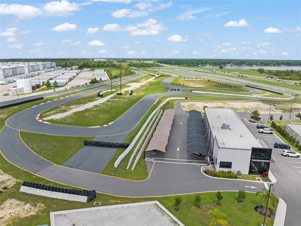 396 Chicane Circle, Unit 5 Auburndale, FL 33823 - Photo 30 of 62 an aerial view of a house with a swimming pool