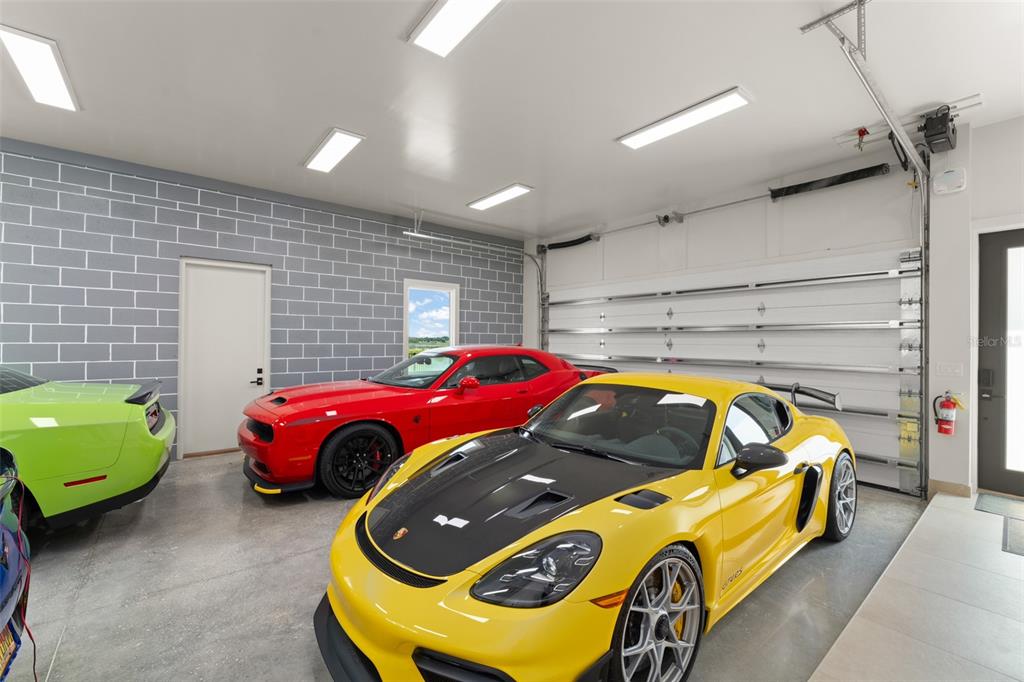 396 Chicane Circle, Unit 5 Auburndale, FL 33823 - Photo 34 of 62 a bedroom with a bed and a car parked