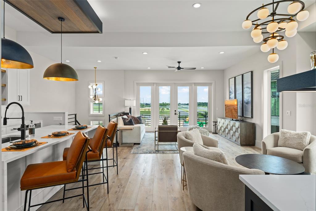 396 Chicane Circle, Unit 5 Auburndale, FL 33823 - Photo 38 of 62 a large kitchen with a table and chairs