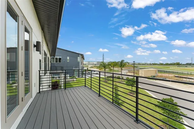 a view of swimming pool with outdoor seating
