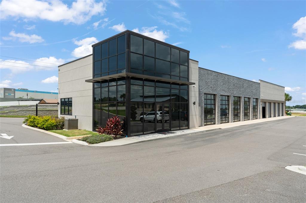 396 Chicane Circle, Unit 5 Auburndale, FL 33823 - Photo 48 of 62 a view of a building with a street