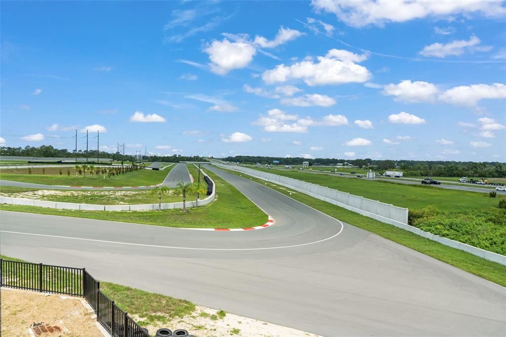 396 Chicane Circle, Unit 5 Auburndale, FL 33823 - Photo 52 of 62 a view of a swimming pool and an outdoor seating