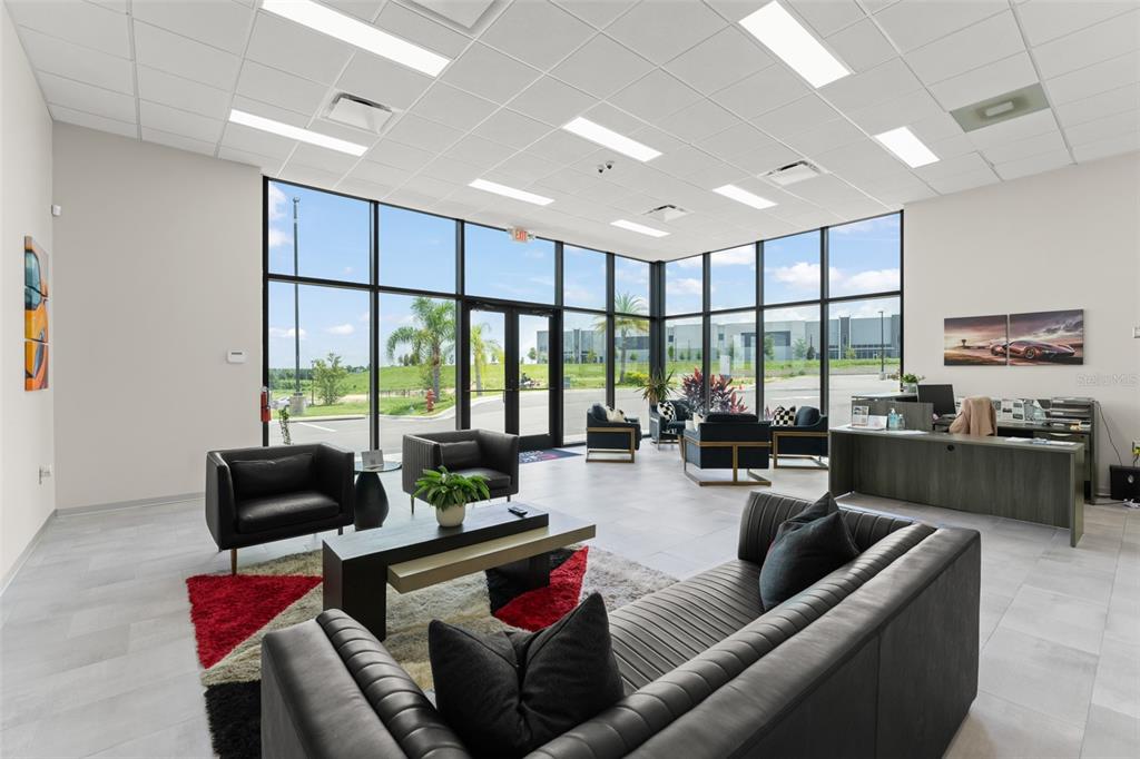 396 Chicane Circle, Unit 5 Auburndale, FL 33823 - Photo 58 of 62 a living room with furniture and a large window