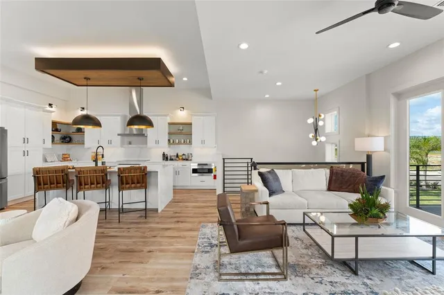 a bedroom with a bed and glass door