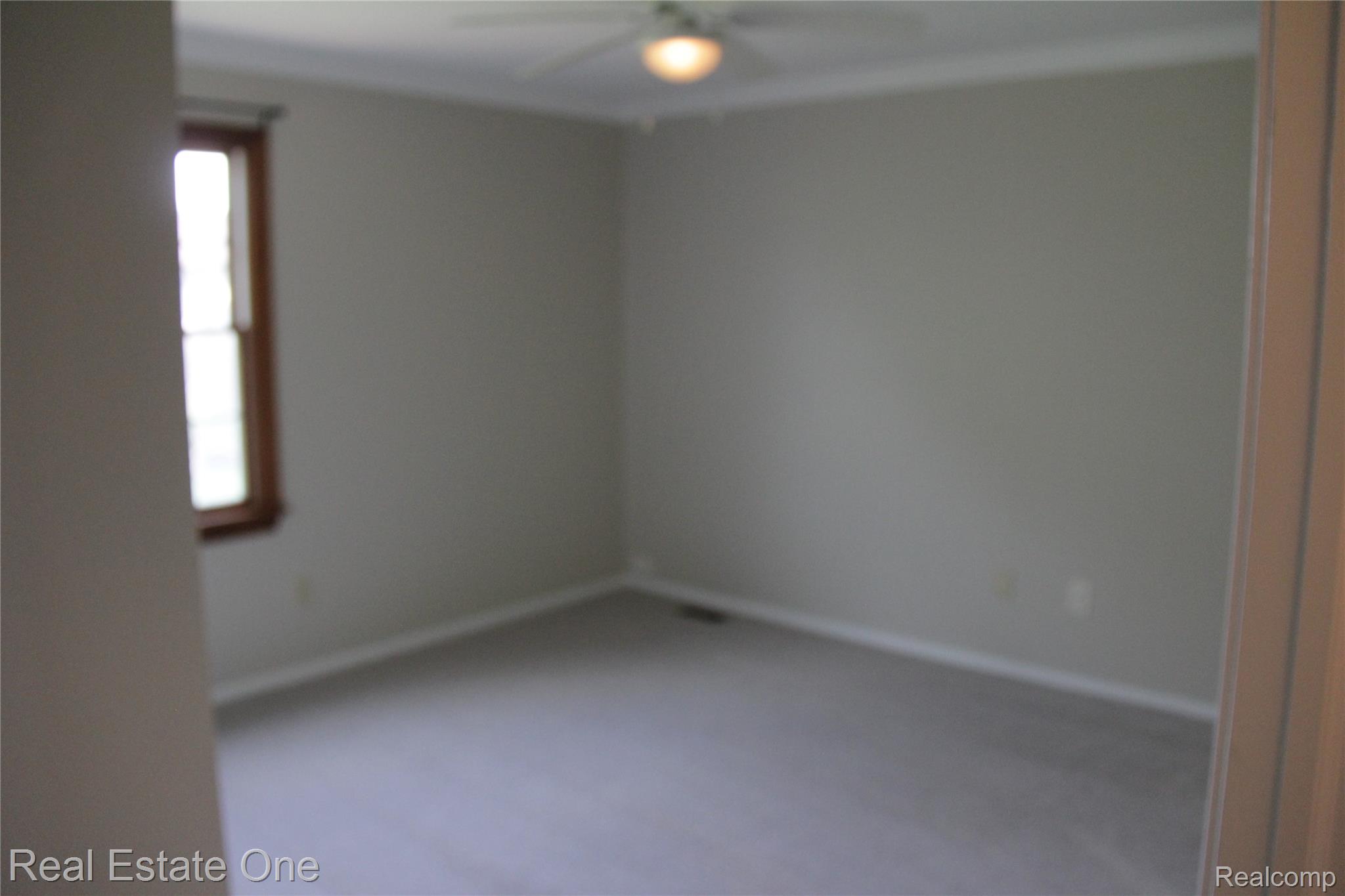 44777 Saltz Road Canton, MI 48187 - Photo 48 of 65 Bedroom with a ceiling fan, crown molding