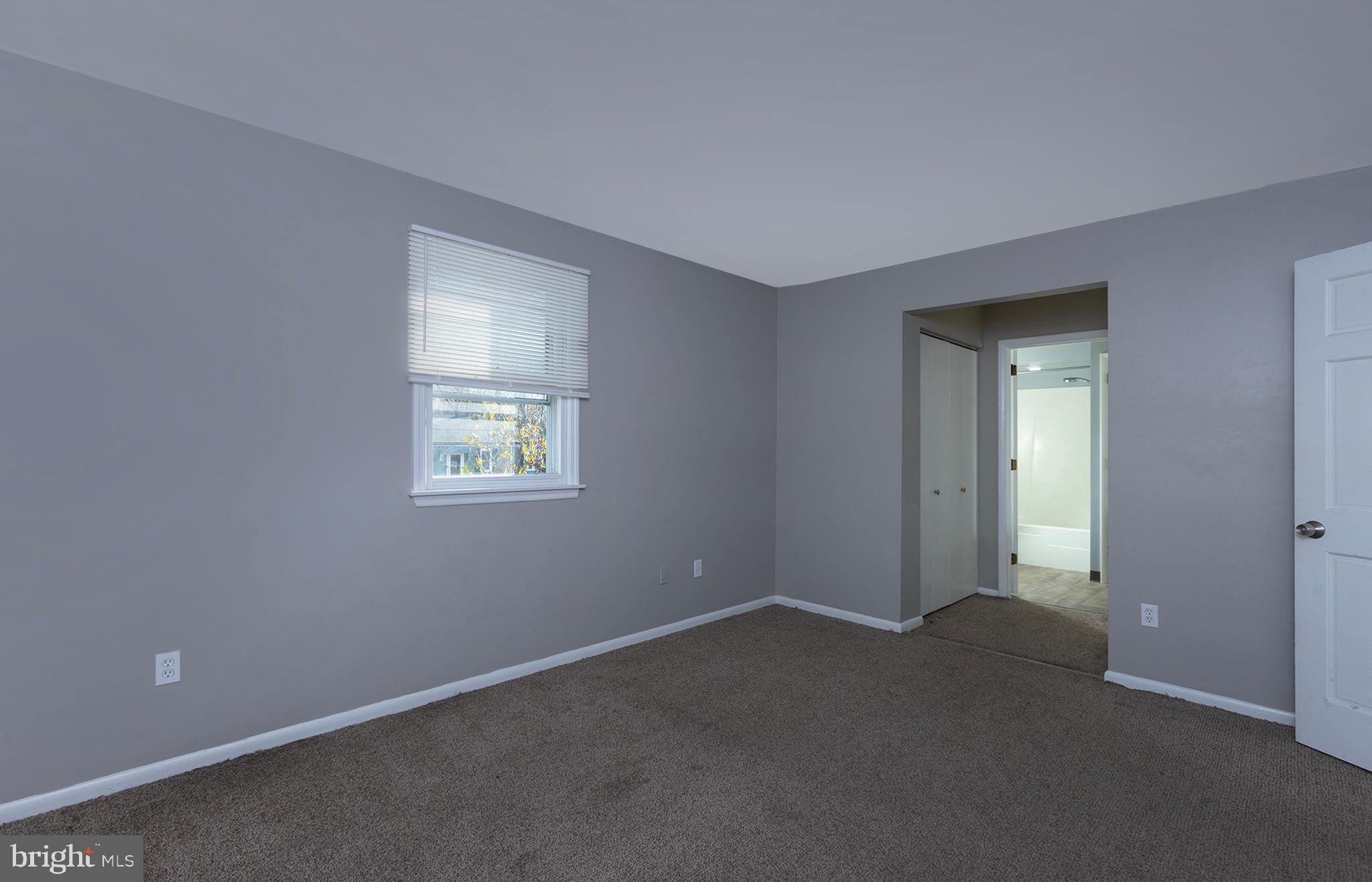 110 Sunset Avenue, Unit 201 Harrisburg, PA 17112 - Photo 16 of 22 a view of an empty room with a window