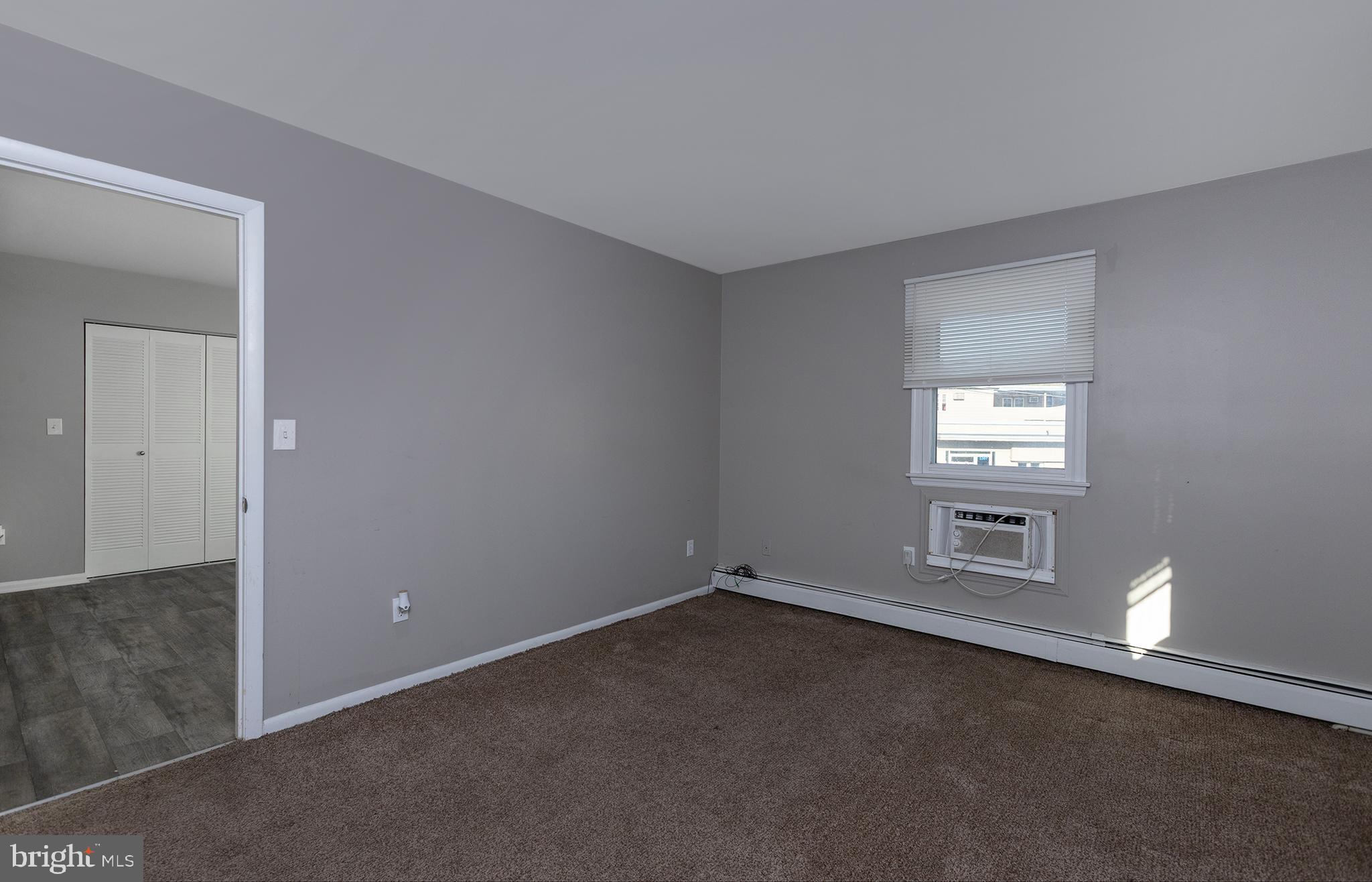 110 Sunset Avenue, Unit 201 Harrisburg, PA 17112 - Photo 18 of 22 a view of an empty room with a window
