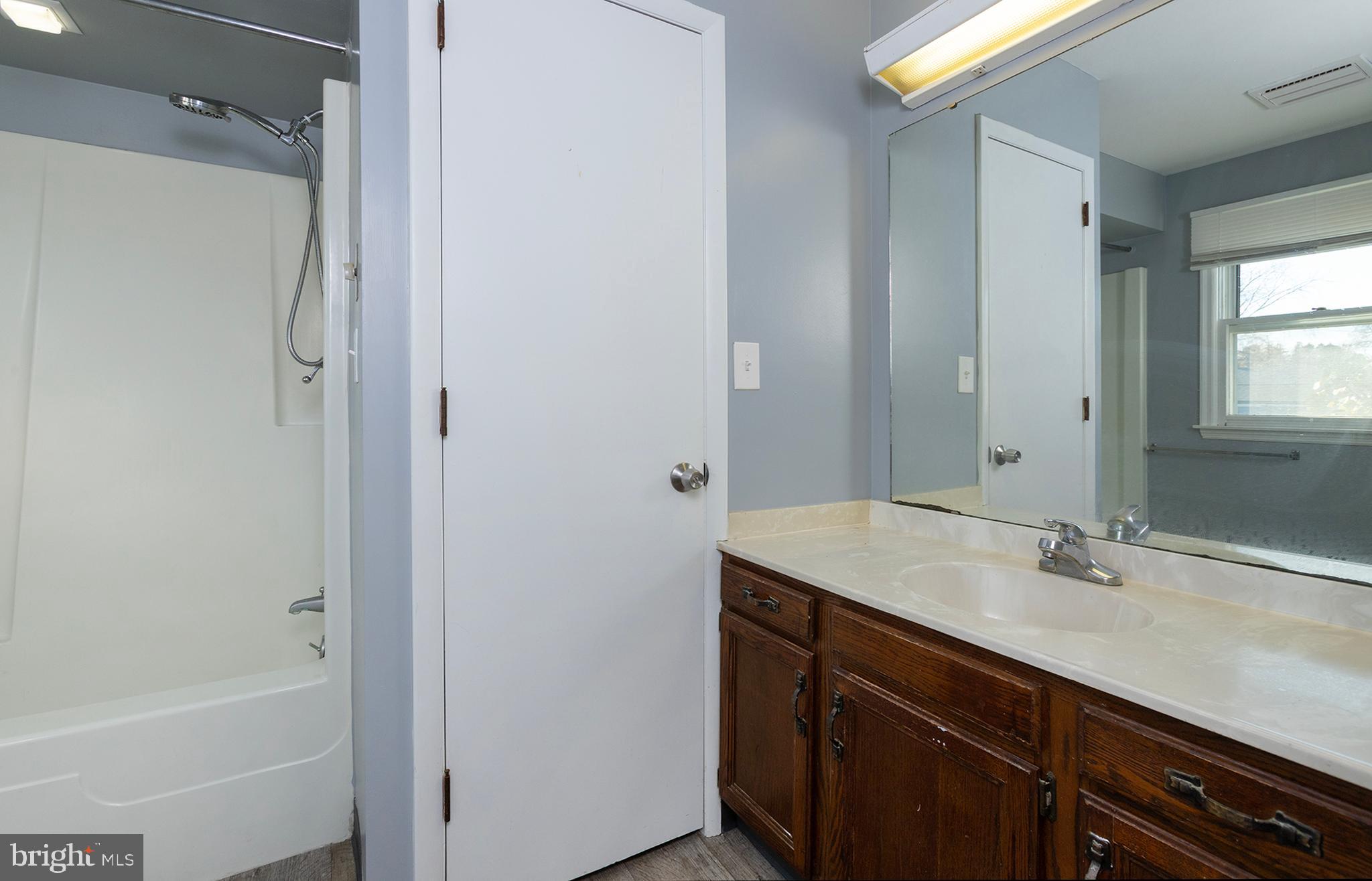 110 Sunset Avenue, Unit 201 Harrisburg, PA 17112 - Photo 20 of 22 a bathroom with a sink and a mirror