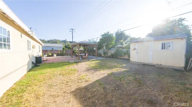a view of swimming pool with outdoor seating