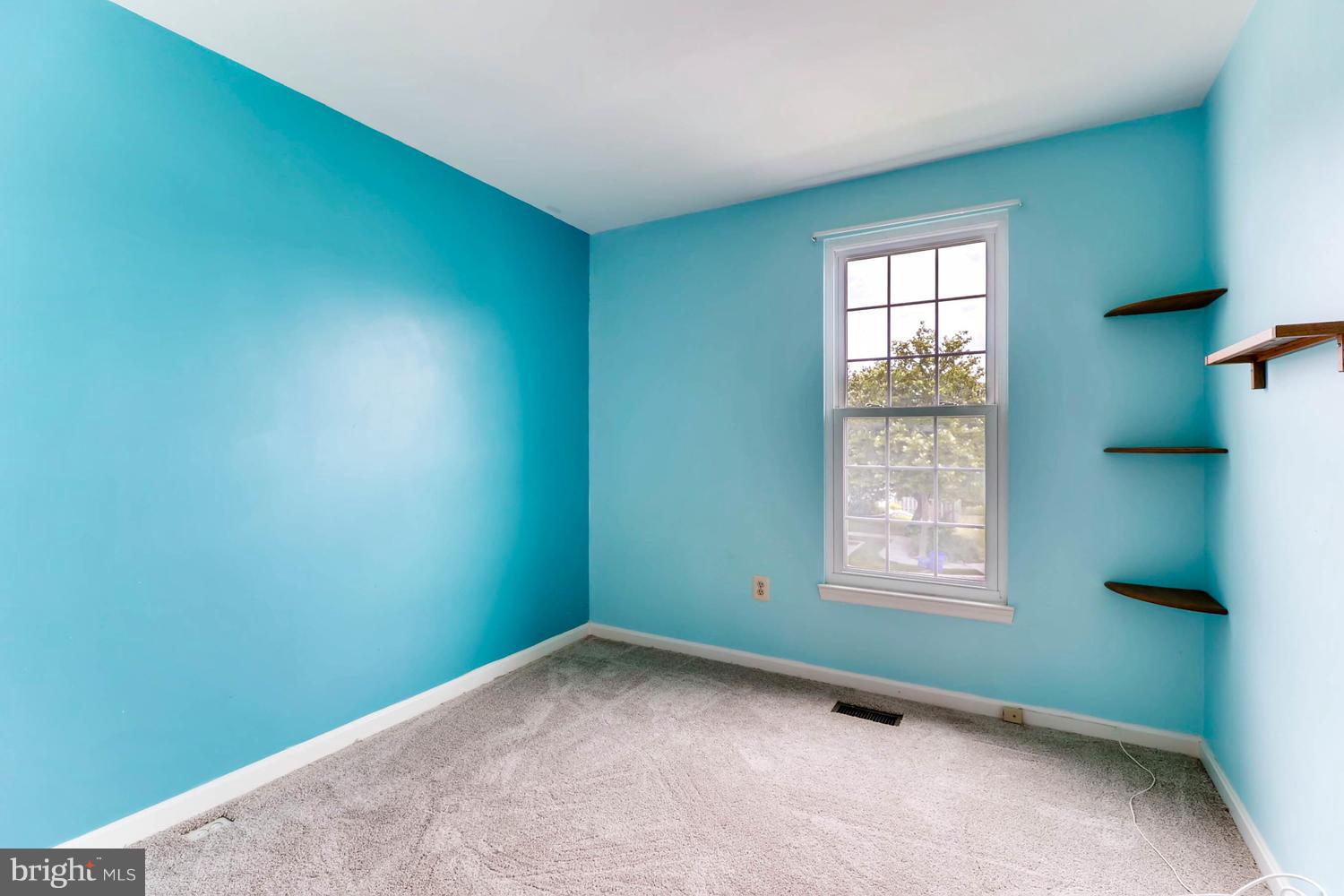 4414 Cole Farm Road Baltimore, MD 21236 - Photo 24 of 30 an empty room with windows