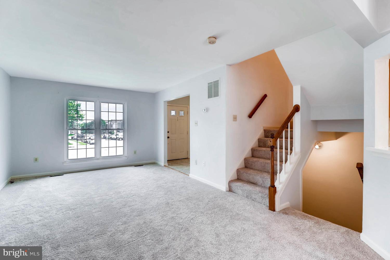 4414 Cole Farm Road Baltimore, MD 21236 - Photo 6 of 30 a view of an empty room with a window