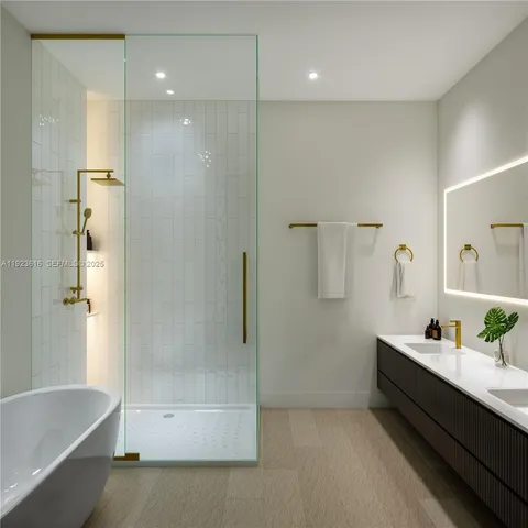 a bathroom with a bathtub and a shower