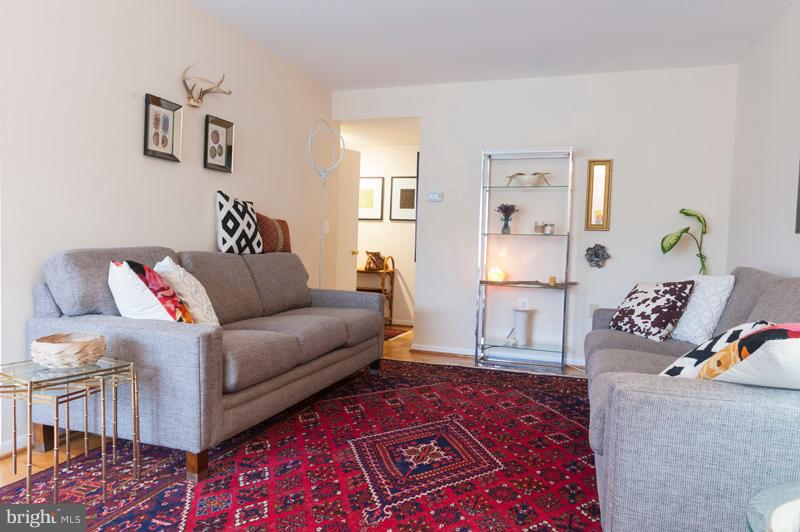 112 Cross Keys Road, Unit R112C Baltimore, MD 21210 - Photo 11 of 36 Living Room flows to Foyer