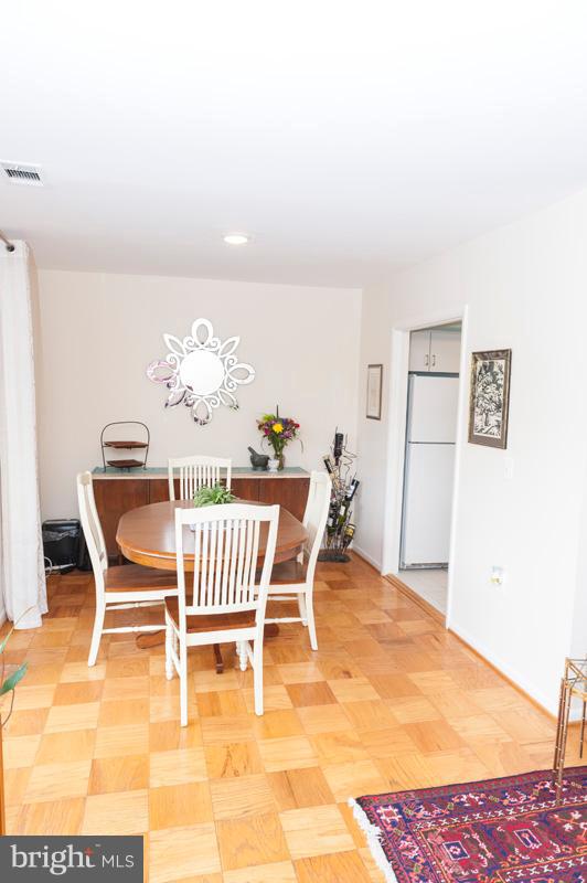 112 Cross Keys Road, Unit R112C Baltimore, MD 21210 - Photo 19 of 36 Dining Room w/Wood Floors