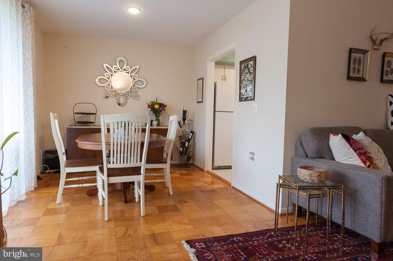 112 Cross Keys Road, Unit R112C Baltimore, MD 21210 - Photo 20 of 36 Dining Room flows to Kitchen