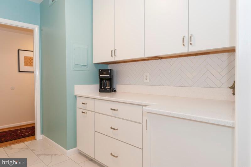 112 Cross Keys Road, Unit R112C Baltimore, MD 21210 - Photo 23 of 36 Kitchen w/Drawers & Trash Bin Cabinet
