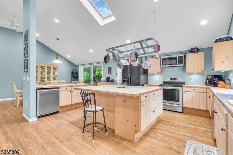 9 Mueller Lane Washington, NJ 07882 - Photo 13 of 45 a kitchen with granite countertop white cabinets and white appliances