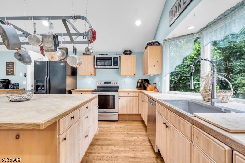 9 Mueller Lane Washington, NJ 07882 - Photo 16 of 45 a kitchen with cabinets a sink and appliances
