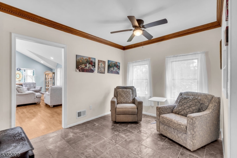 9 Mueller Lane Washington, NJ 07882 - Photo 18 of 45 a living room with furniture and a ceiling fan