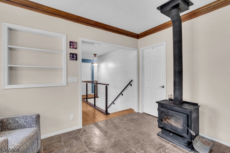 9 Mueller Lane Washington, NJ 07882 - Photo 20 of 45 a view of a hallway with staircase