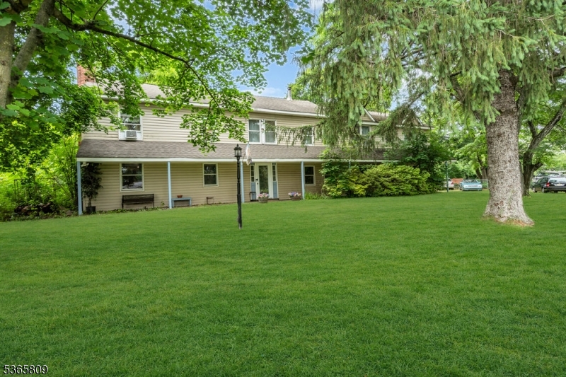 9 Mueller Lane Washington, NJ 07882 - Photo 2 of 45 a front view of a house with a garden