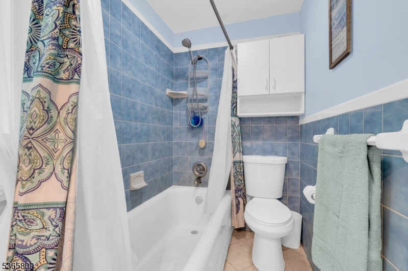 9 Mueller Lane Washington, NJ 07882 - Photo 25 of 45 a white toilet sitting next to a bath tub