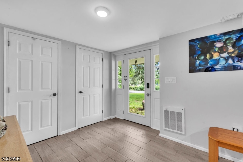 9 Mueller Lane Washington, NJ 07882 - Photo 3 of 45 a view of an empty room with a window