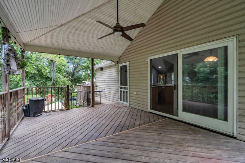 9 Mueller Lane Washington, NJ 07882 - Photo 32 of 45 a porch with wooden floor and outdoor space