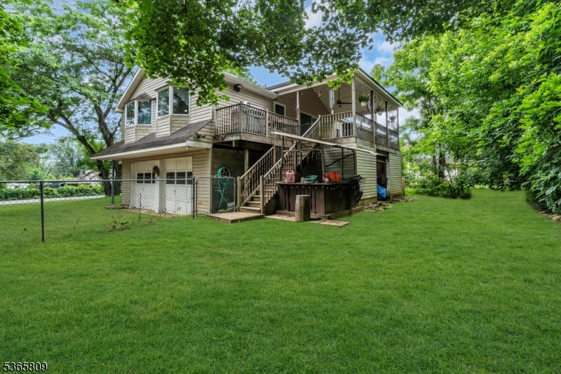 9 Mueller Lane Washington, NJ 07882 - Photo 35 of 45 a view of a house with a big yard and large trees