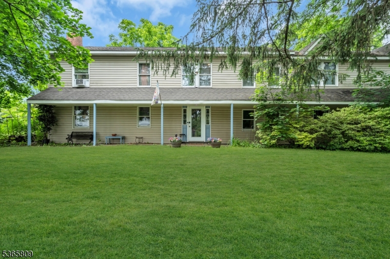 9 Mueller Lane Washington, NJ 07882 - Photo 44 of 45 a front view of a house with a garden