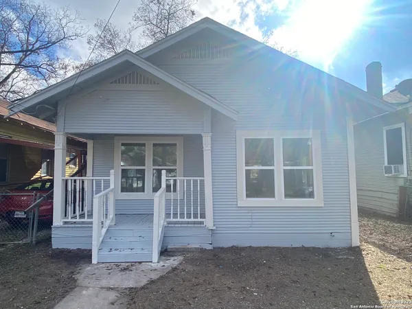 a front view of a house with a porch