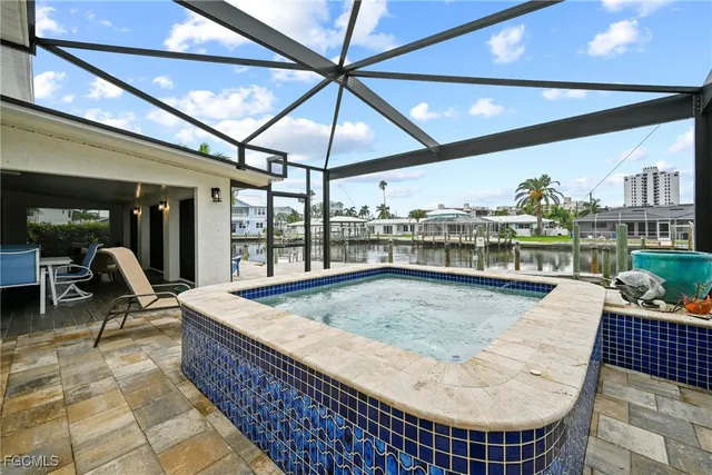 a outdoor space with swimming pool and furniture