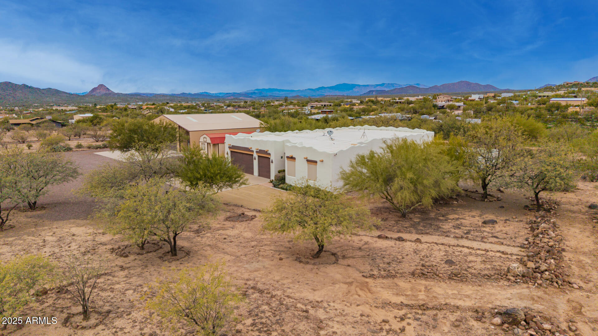 1540 East Circle Mountain Road New River, AZ 85087 - Photo 11 of 65 a view of a town with mountains in the background
