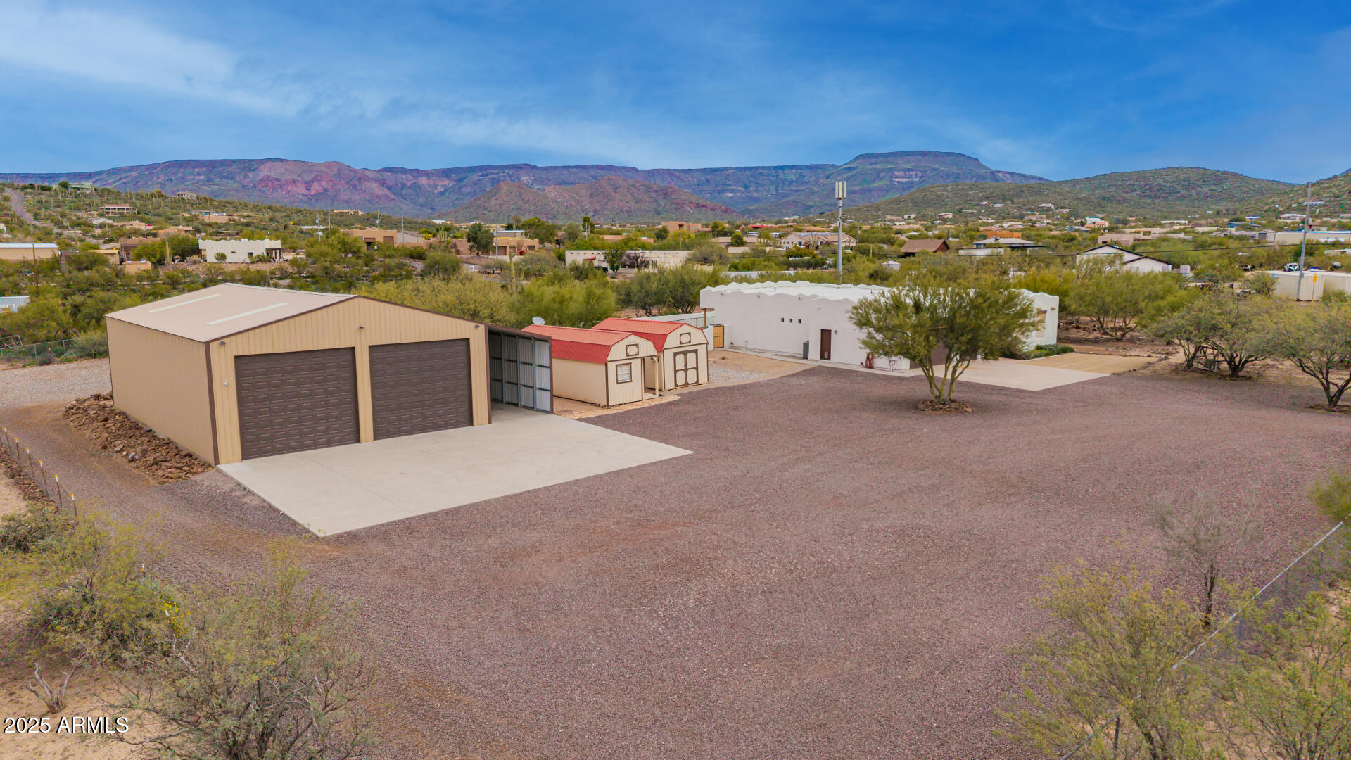 1540 East Circle Mountain Road New River, AZ 85087 - Photo 17 of 65 a view of a terrace with a city
