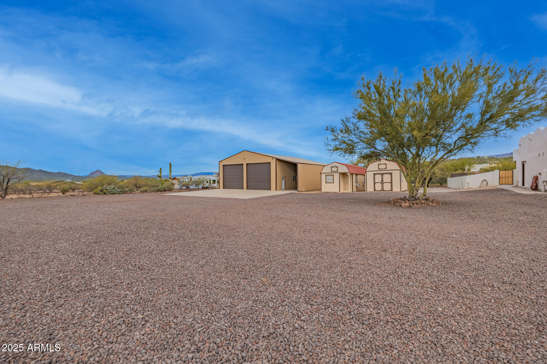 1540 East Circle Mountain Road New River, AZ 85087 - Photo 19 of 65 a view of house with yard and lake view