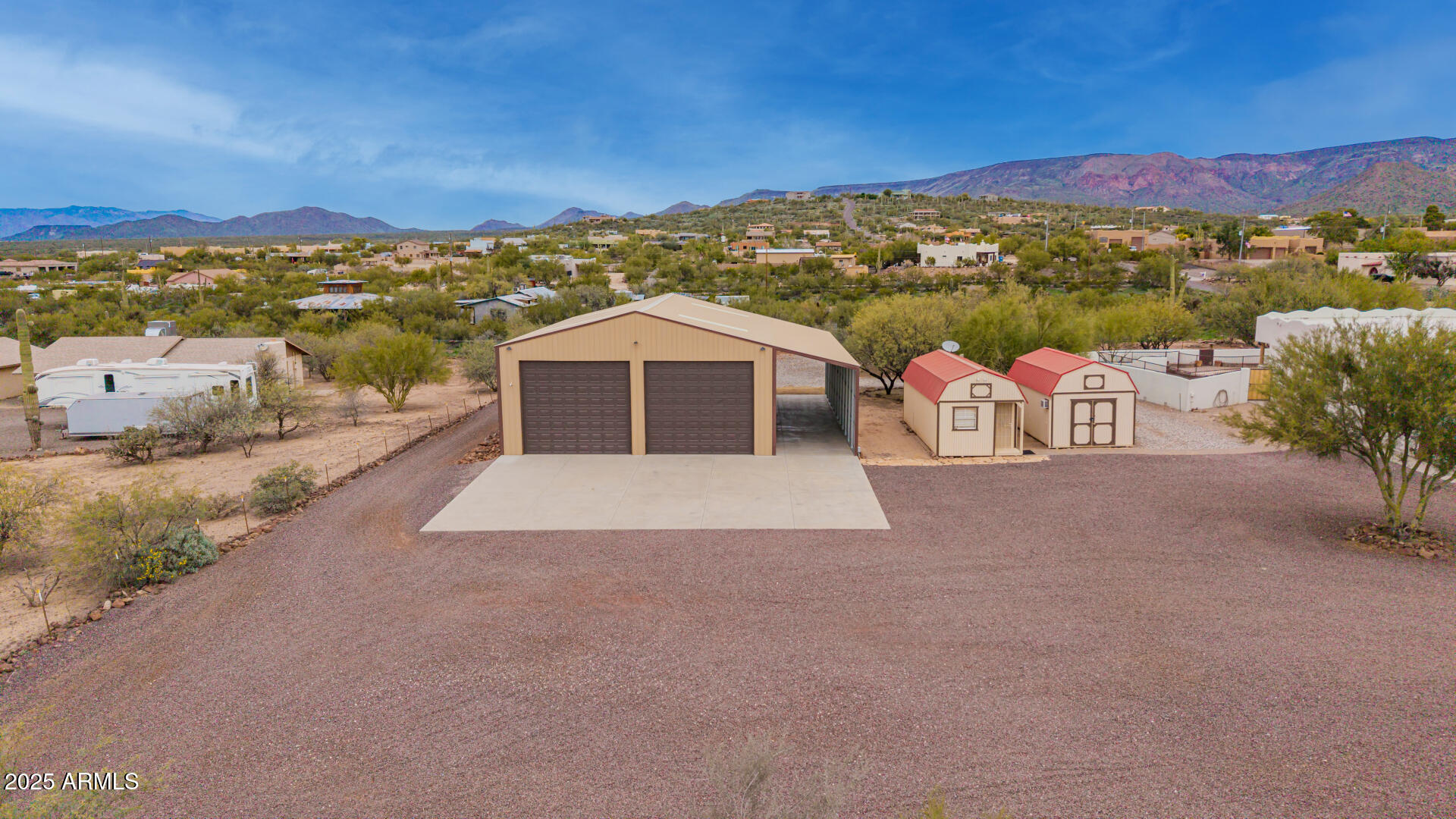 1540 East Circle Mountain Road New River, AZ 85087 - Photo 23 of 65 a view of a terrace with a garden