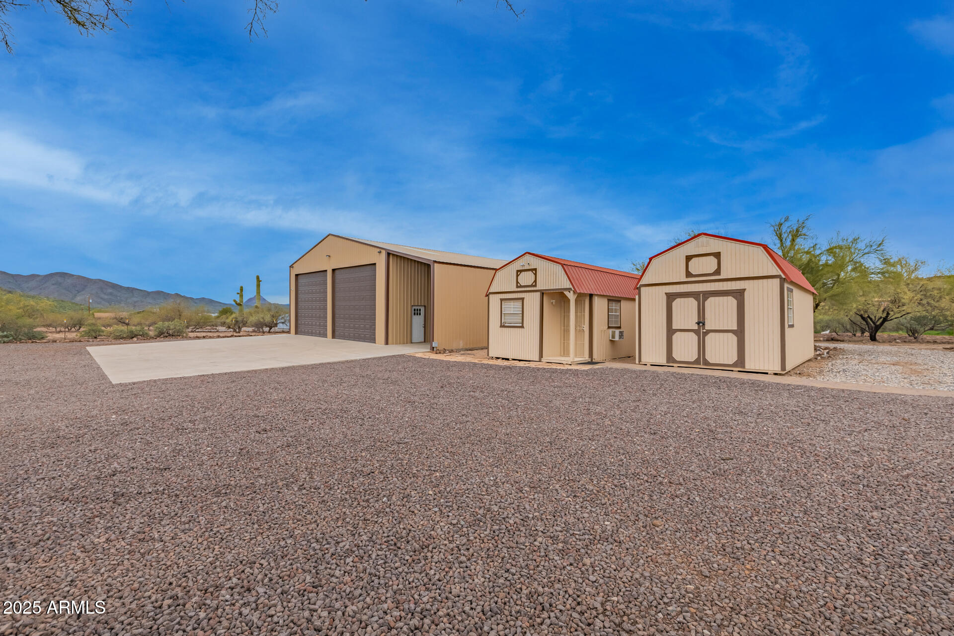 1540 East Circle Mountain Road New River, AZ 85087 - Photo 25 of 65 a view of a house with a yard