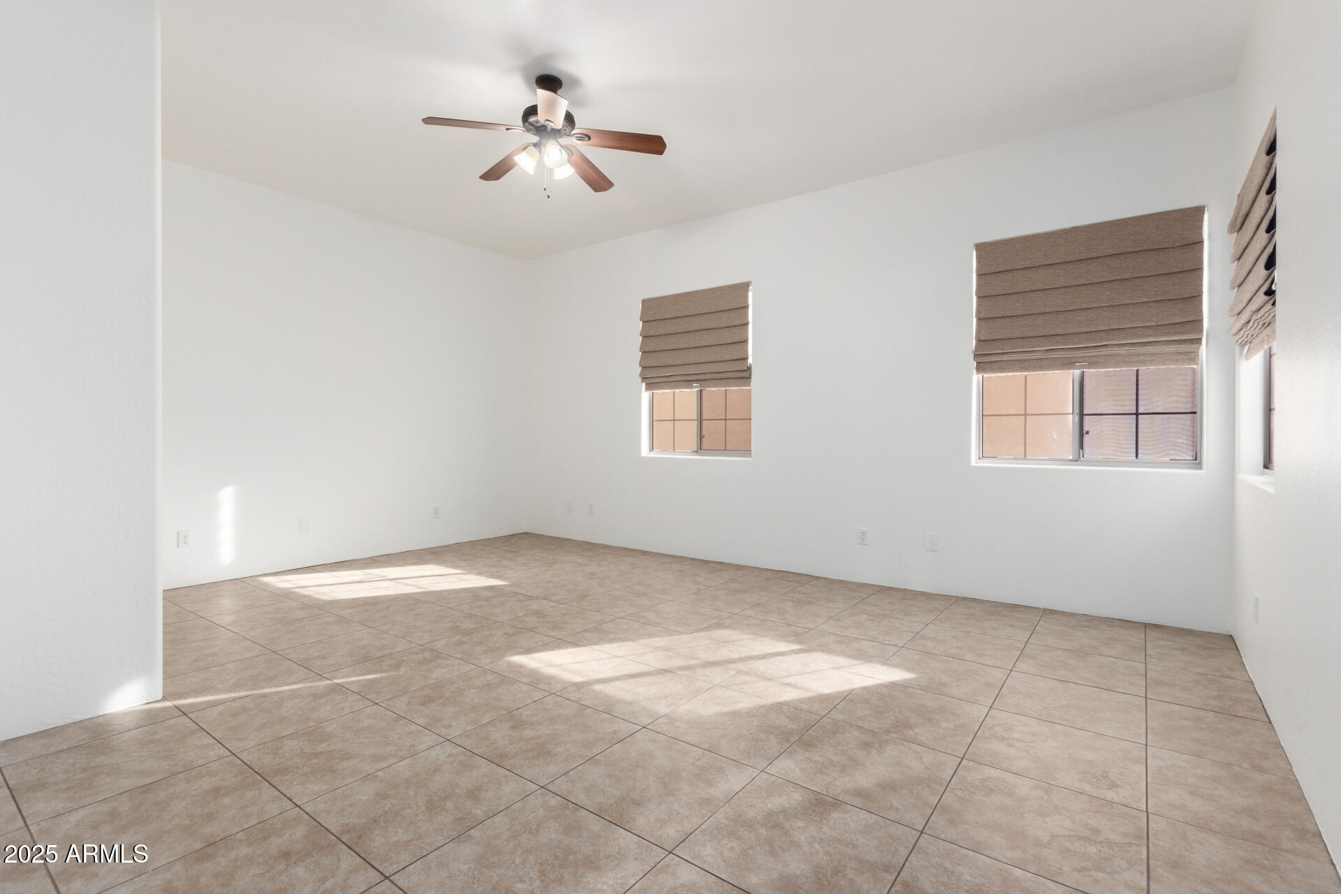 1540 East Circle Mountain Road New River, AZ 85087 - Photo 42 of 65 a view of an empty room with a window