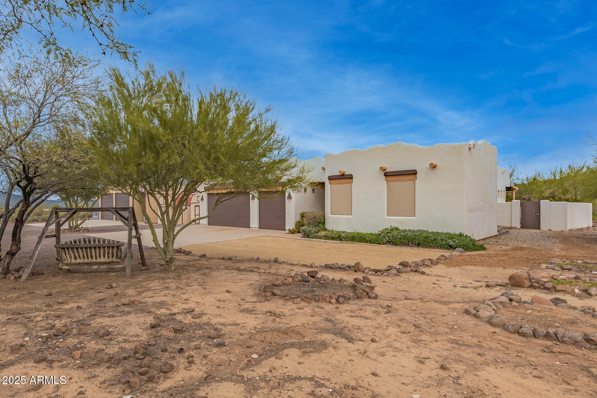1540 East Circle Mountain Road New River, AZ 85087 - Photo 6 of 65 a view of a house with a snow