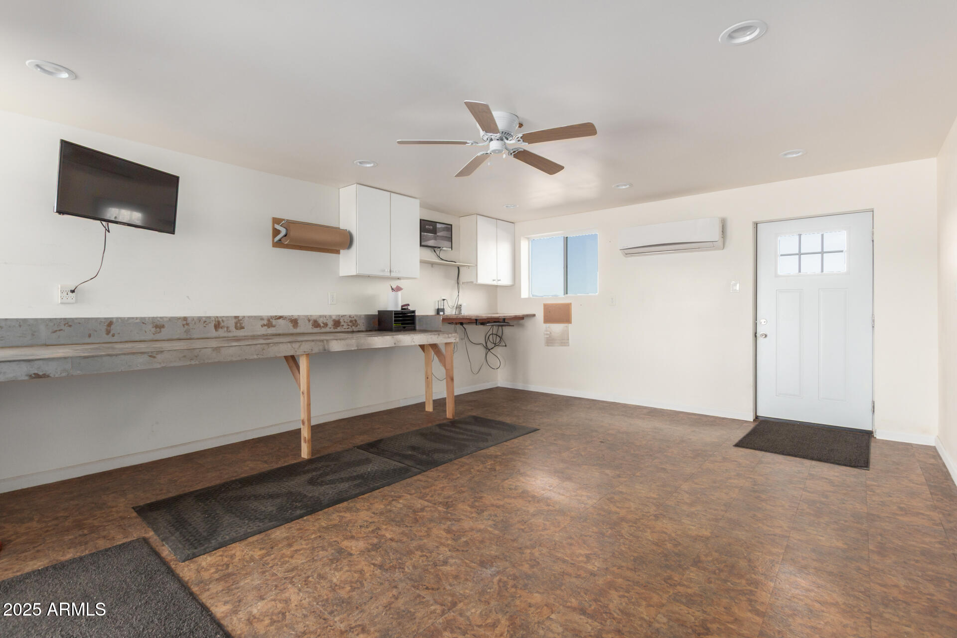 1540 East Circle Mountain Road New River, AZ 85087 - Photo 63 of 65 a view of kitchen with granite countertop cabinets and refrigerator
