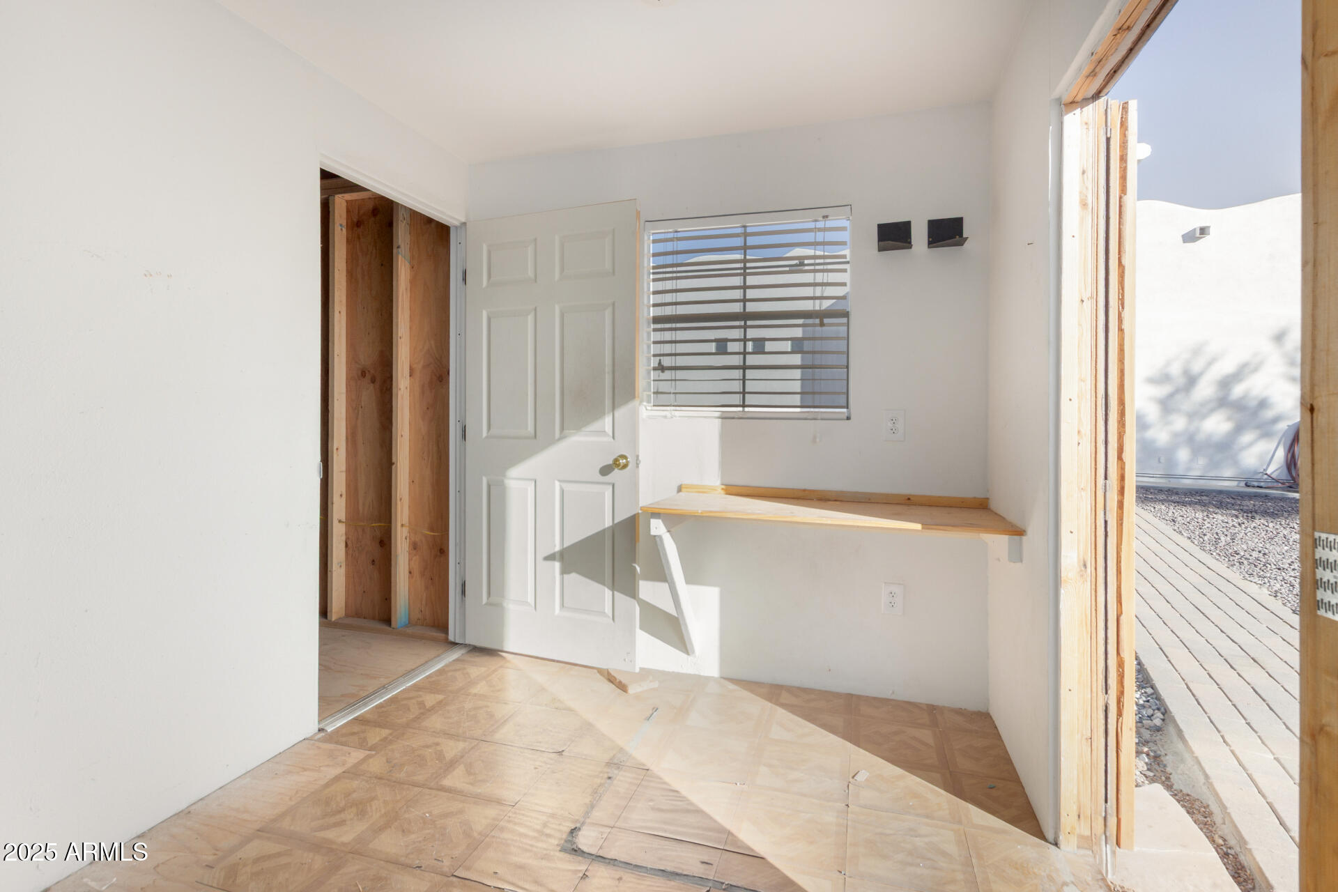 1540 East Circle Mountain Road New River, AZ 85087 - Photo 64 of 65 a view of an empty room with a window