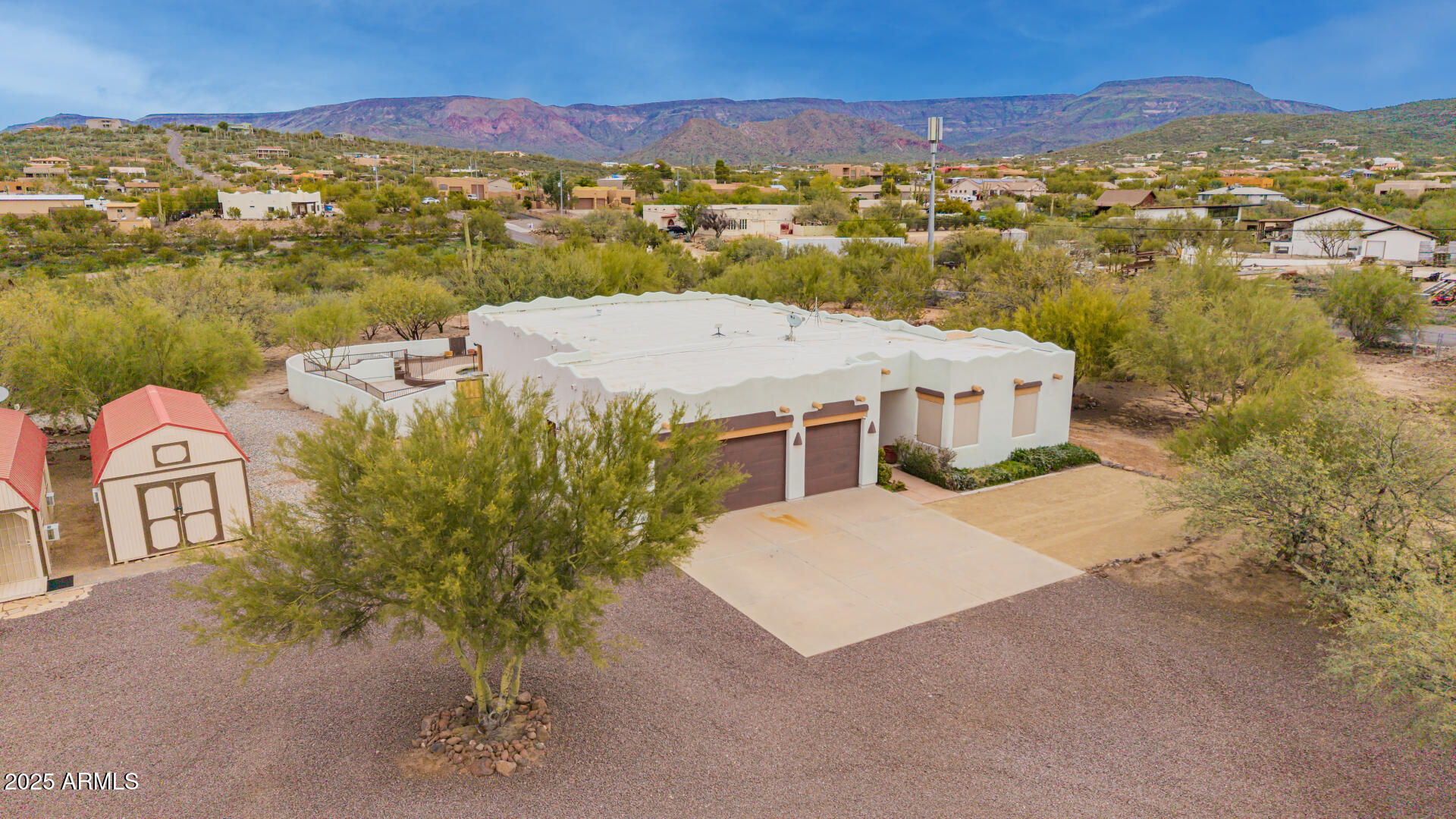 1540 East Circle Mountain Road New River, AZ 85087 - Photo 9 of 65 an aerial view of a house with a mountain