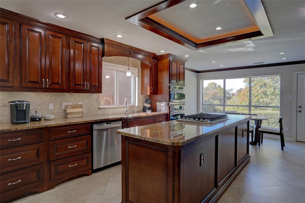 2905 Wyndham Lane Richardson, TX 75082 - Photo 11 of 27 a kitchen with a sink and large window