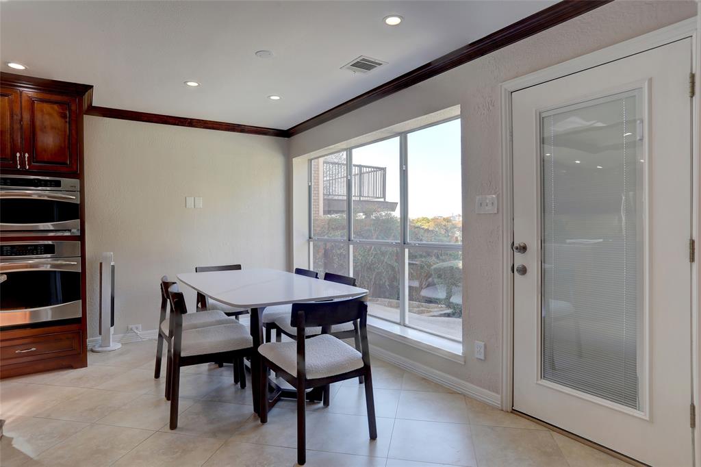 2905 Wyndham Lane Richardson, TX 75082 - Photo 12 of 27 a dining room with furniture and a window