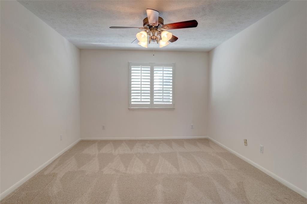 2905 Wyndham Lane Richardson, TX 75082 - Photo 19 of 27 wooden floor in an empty room with a window