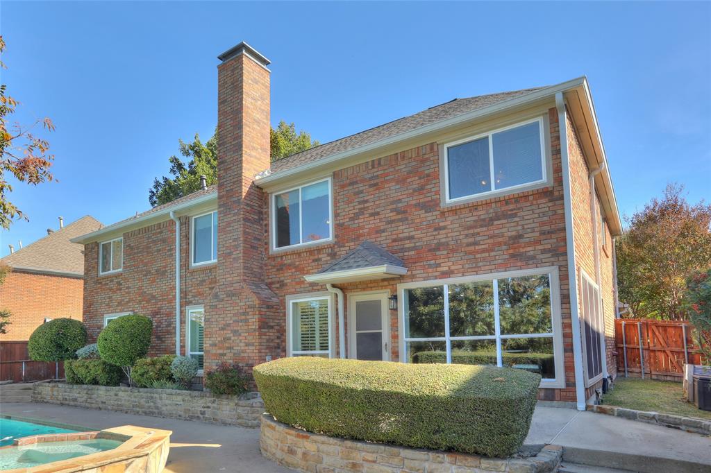2905 Wyndham Lane Richardson, TX 75082 - Photo 25 of 27 a front view of a house with a yard
