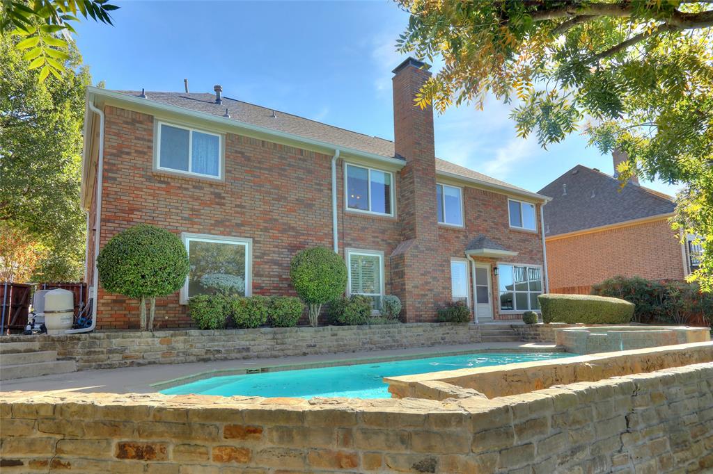 2905 Wyndham Lane Richardson, TX 75082 - Photo 26 of 27 a front view of a house with garden