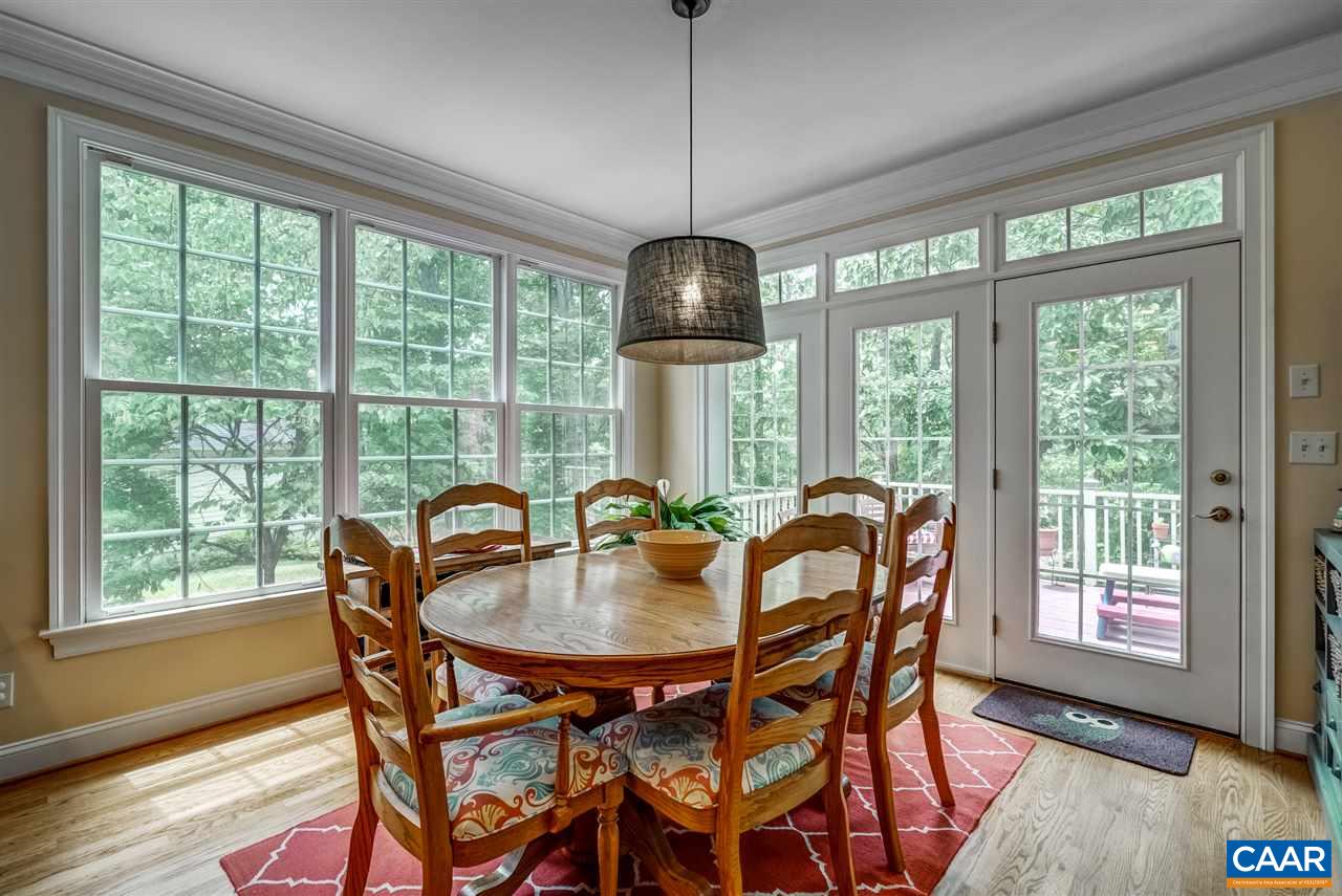 3465 Darby Road Keswick, VA 22947 - Photo 16 of 48 a dining room with furniture window wooden floor