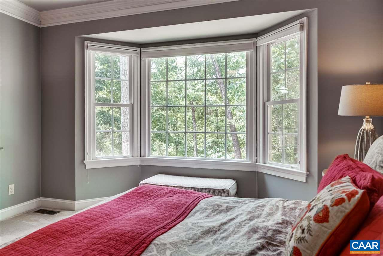 3465 Darby Road Keswick, VA 22947 - Photo 23 of 48 a bedroom with a bed and a window